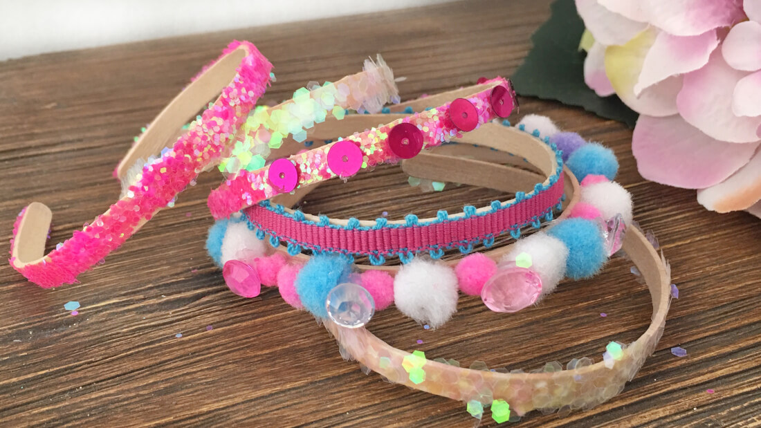 Armreifen aus Holzstäbchen sind die perfekte Bastelaktion für eure Feen- und Einhornparty